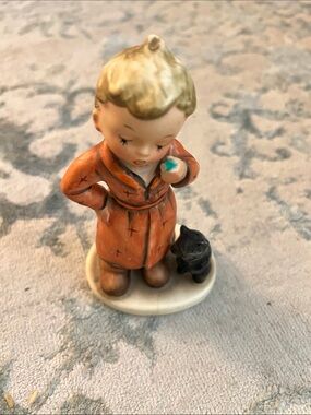 Vintage Porcelain Boy Figurine in Orange Robe with Black Cat